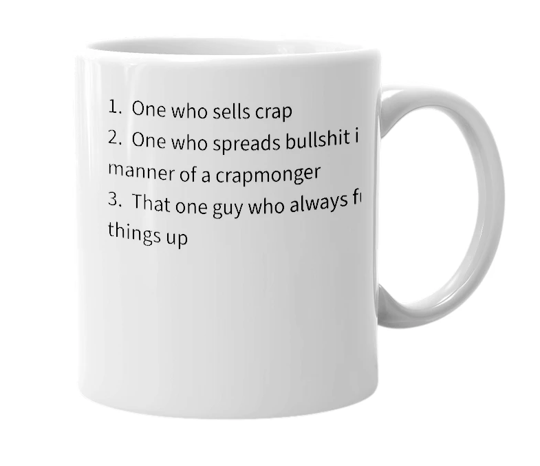 White mug with the definition of 'crapmonger'