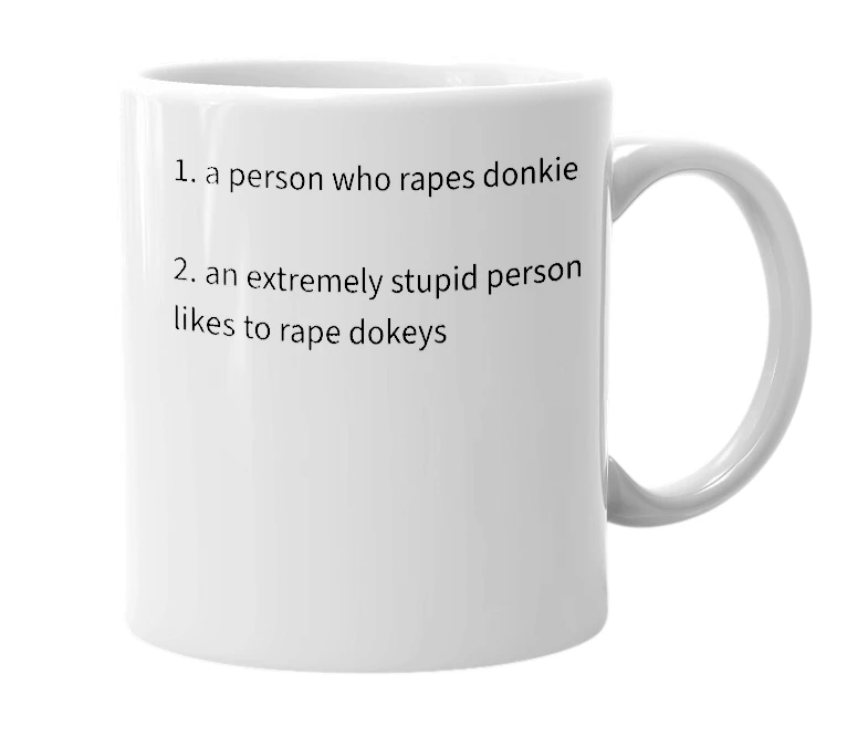 White mug with the definition of 'donkey raper'