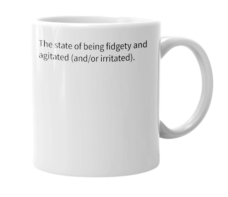 White mug with the definition of 'figitated'