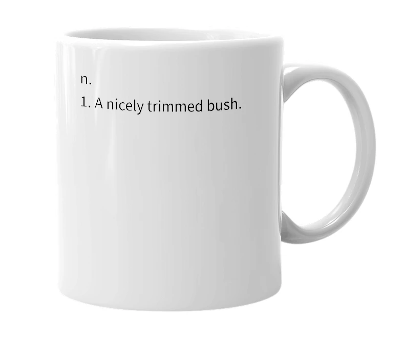 White mug with the definition of 'hedge'