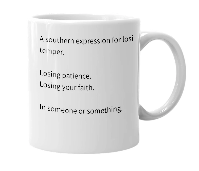White mug with the definition of 'losing my religion'