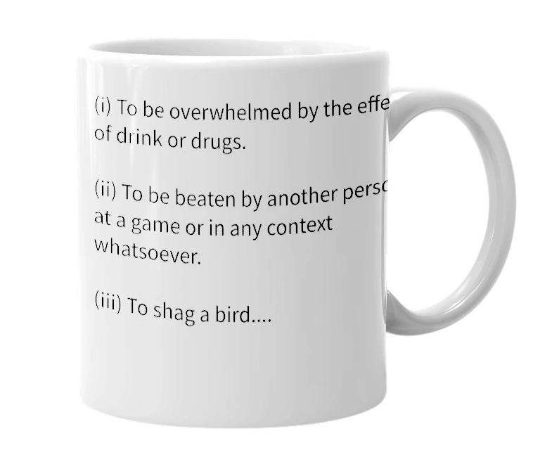 White mug with the definition of 'mauled'