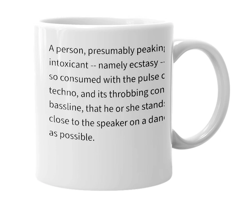 White mug with the definition of 'speaker freaker'