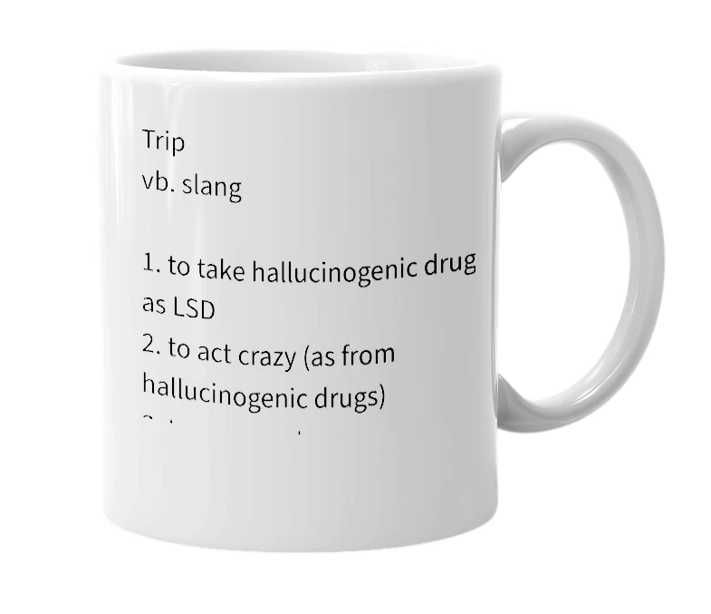 White mug with the definition of 'trip'