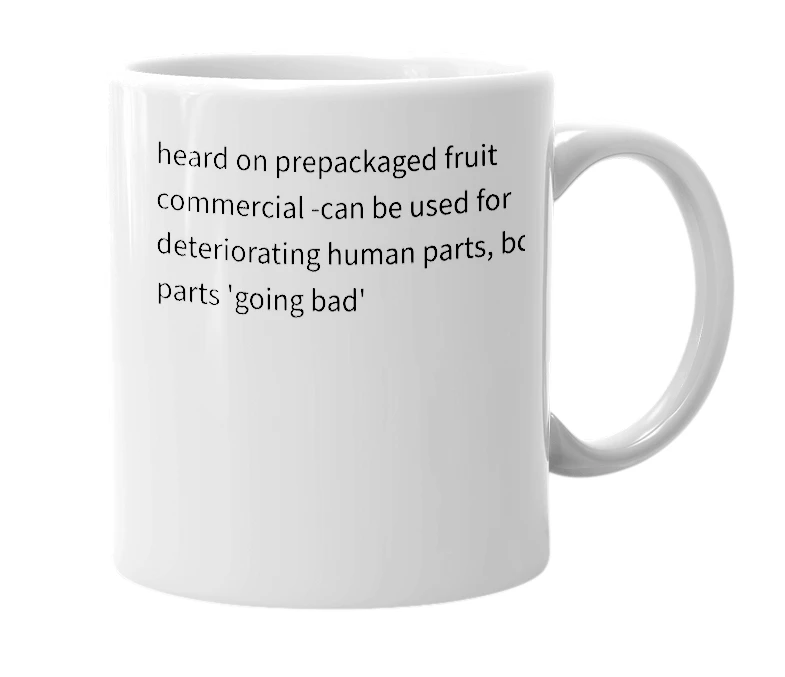 White mug with the definition of 'unripe or spoiled'