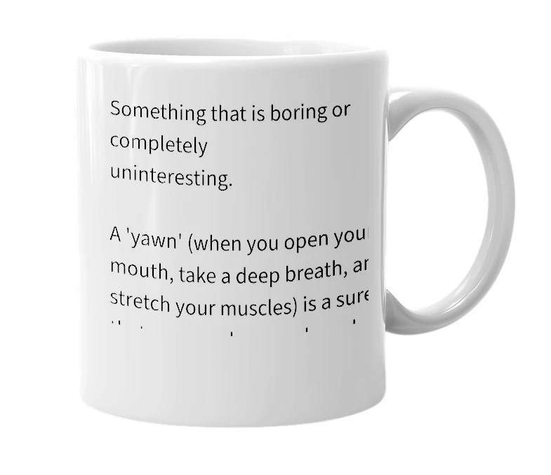 White mug with the definition of 'yawner'