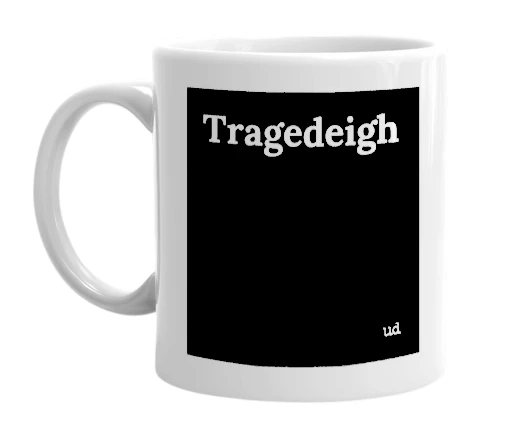 White mug with 'Tragedeigh' in bold black letters