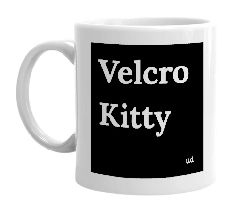 White mug with 'Velcro Kitty' in bold black letters