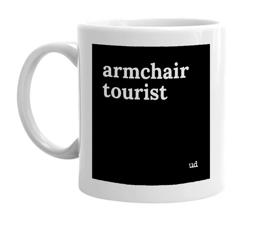 White mug with 'armchair tourist' in bold black letters