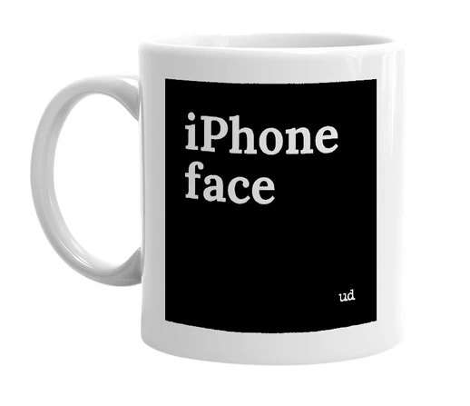 White mug with 'iPhone face' in bold black letters