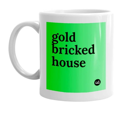 White mug with 'gold bricked house' in bold black letters