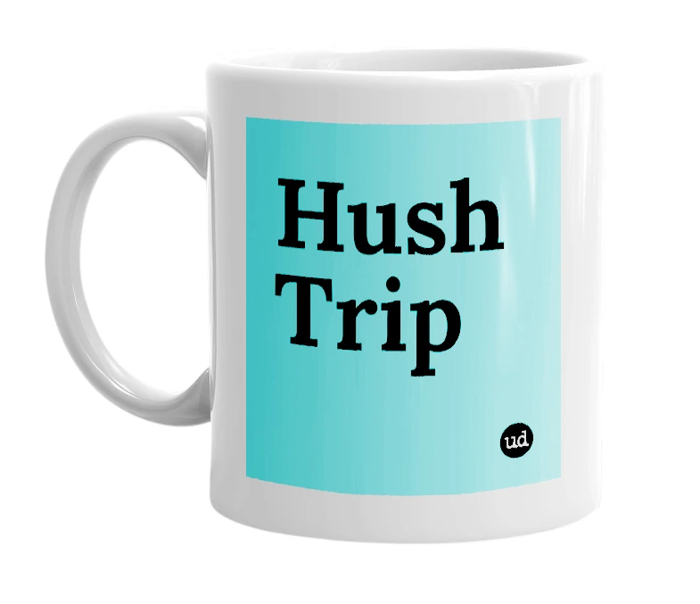 White mug with 'Hush Trip' in bold black letters