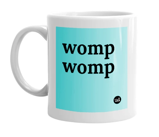 White mug with 'womp womp' in bold black letters