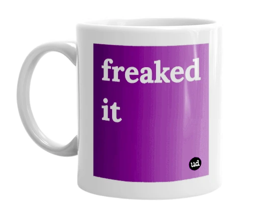 White mug with 'freaked it' in bold black letters