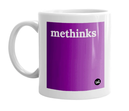 White mug with 'methinks' in bold black letters