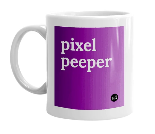 White mug with 'pixel peeper' in bold black letters