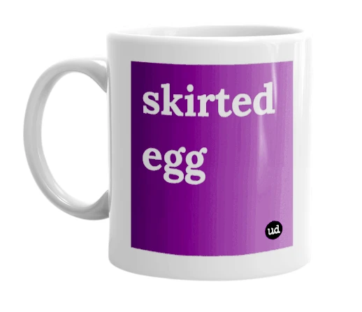 White mug with 'skirted egg' in bold black letters