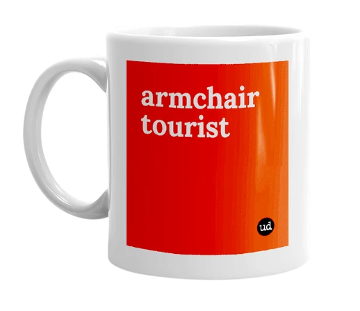 White mug with 'armchair tourist' in bold black letters