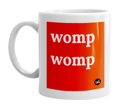 White mug with 'womp womp' in bold black letters