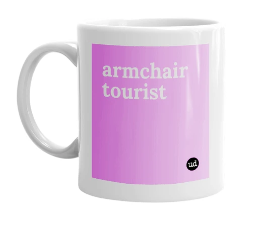 White mug with 'armchair tourist' in bold black letters