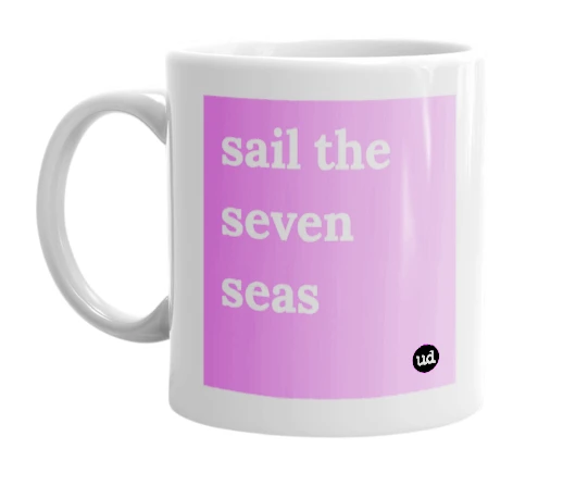 White mug with 'sail the seven seas' in bold black letters