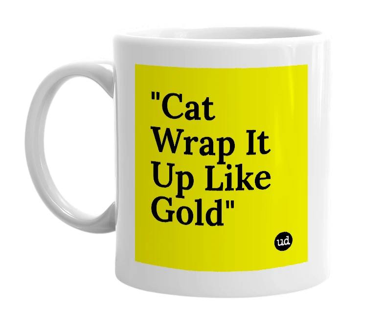 White mug with '"Cat Wrap It Up Like Gold"' in bold black letters