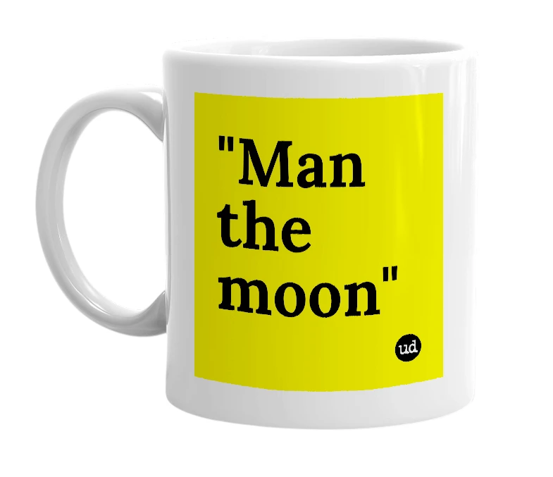 White mug with '"Man the moon"' in bold black letters