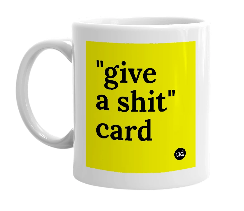 White mug with '"give a shit" card' in bold black letters