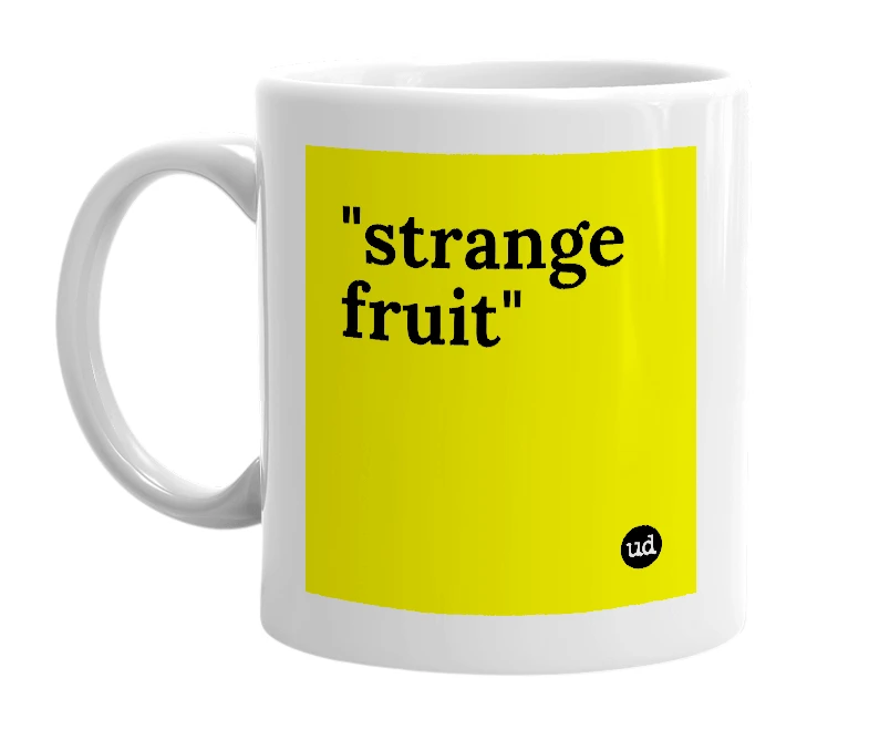 White mug with '"strange fruit"' in bold black letters