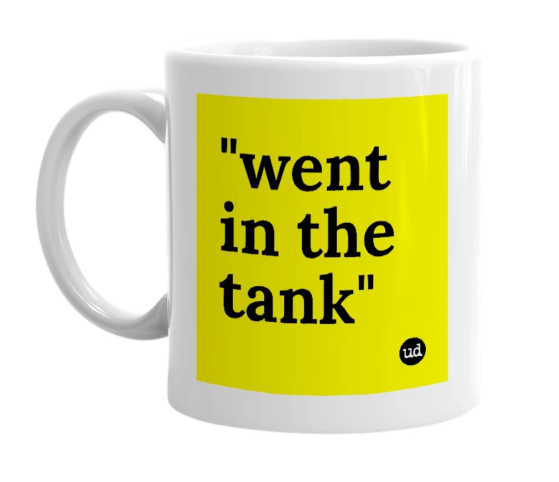 White mug with '"went in the tank"' in bold black letters