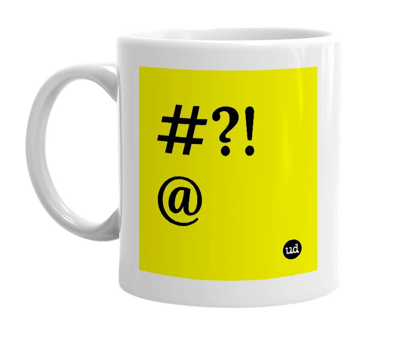 White mug with '#?!@' in bold black letters