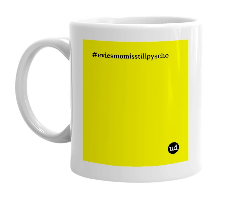 White mug with '#eviesmomisstillpyscho' in bold black letters