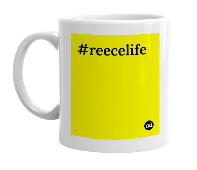 White mug with '#reecelife' in bold black letters