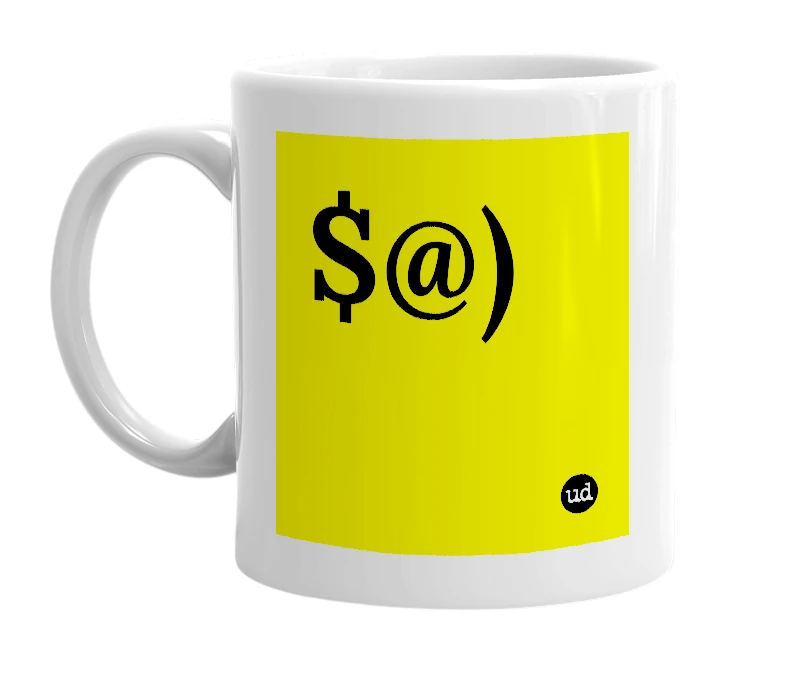 White mug with '$@)' in bold black letters