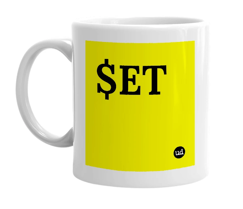 White mug with '$ET' in bold black letters
