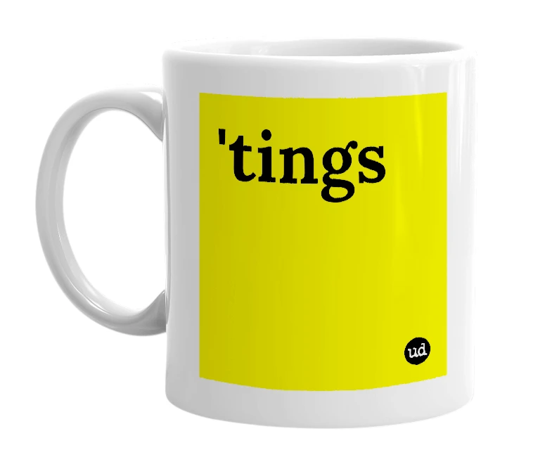 White mug with ''tings' in bold black letters