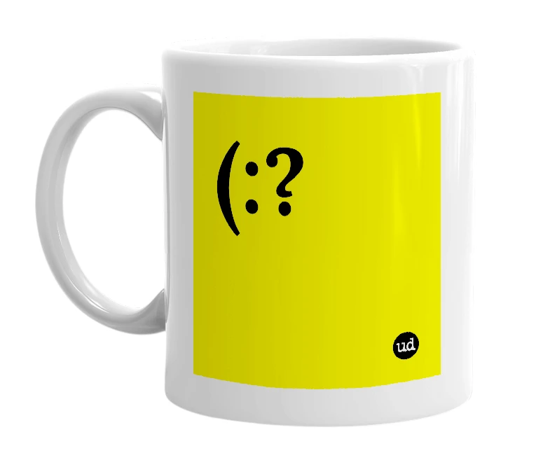 White mug with '(:?' in bold black letters