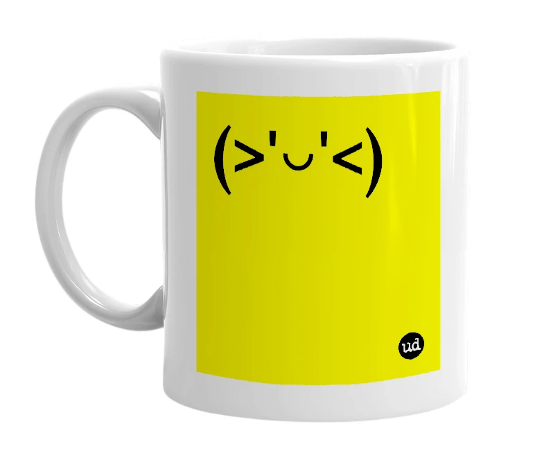 White mug with '(>'◡'<)' in bold black letters