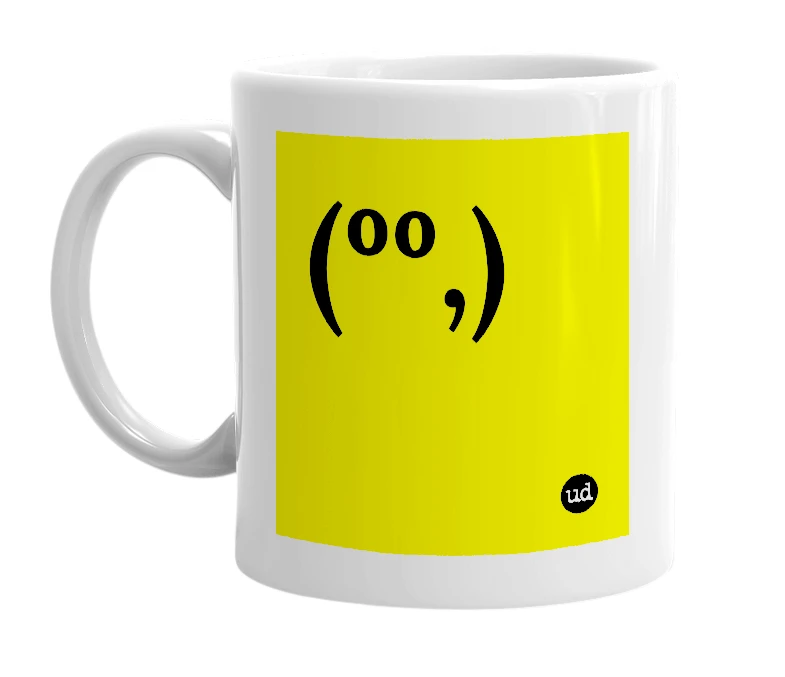 White mug with '(ºº,)' in bold black letters