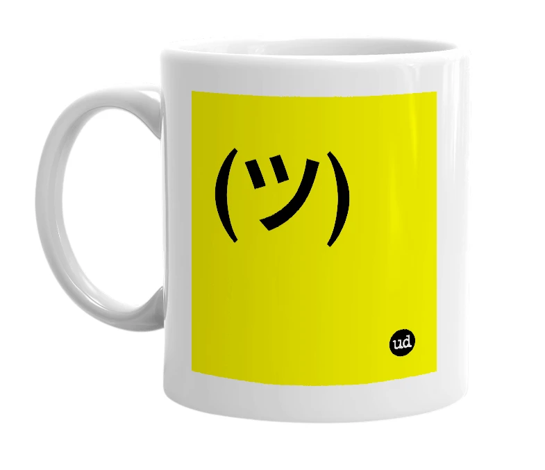 White mug with '(ツ)' in bold black letters