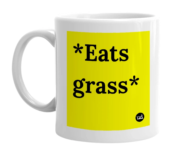 White mug with '*Eats grass*' in bold black letters