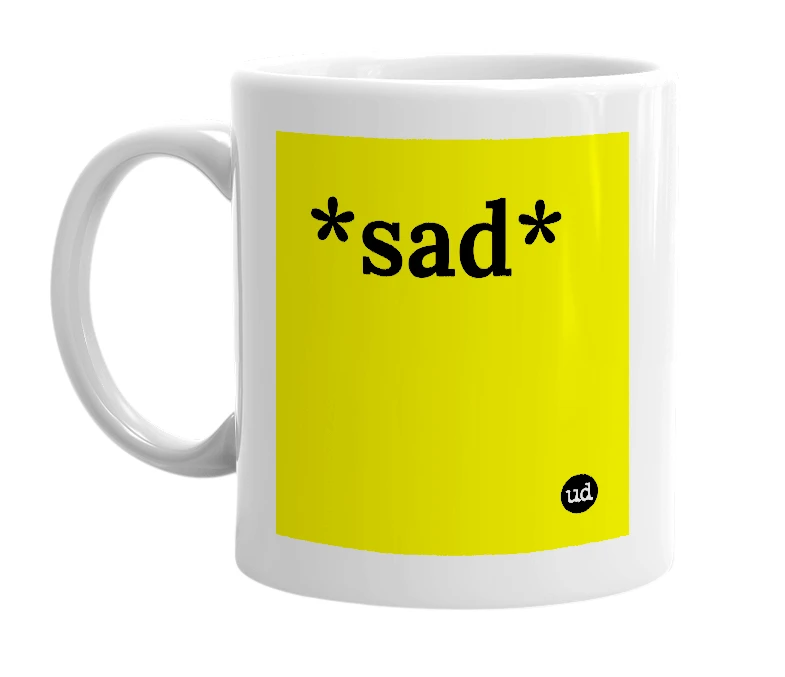 White mug with '*sad*' in bold black letters