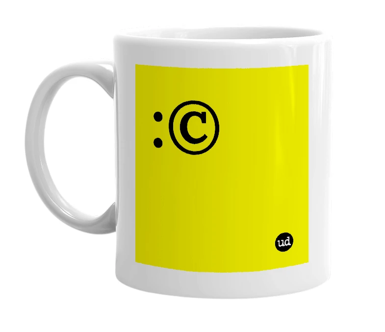 White mug with ':©­' in bold black letters