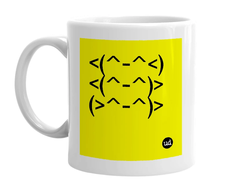 White mug with '<(^-^<) <(^-^)> (>^-^)>' in bold black letters