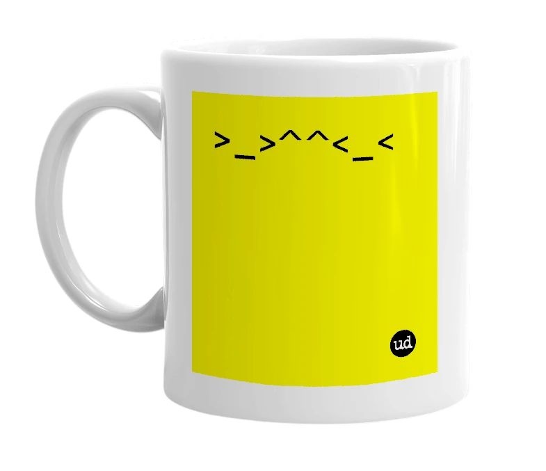 White mug with '>_>^^<_<' in bold black letters