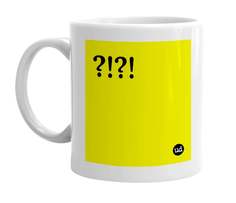 White mug with '?!?!' in bold black letters