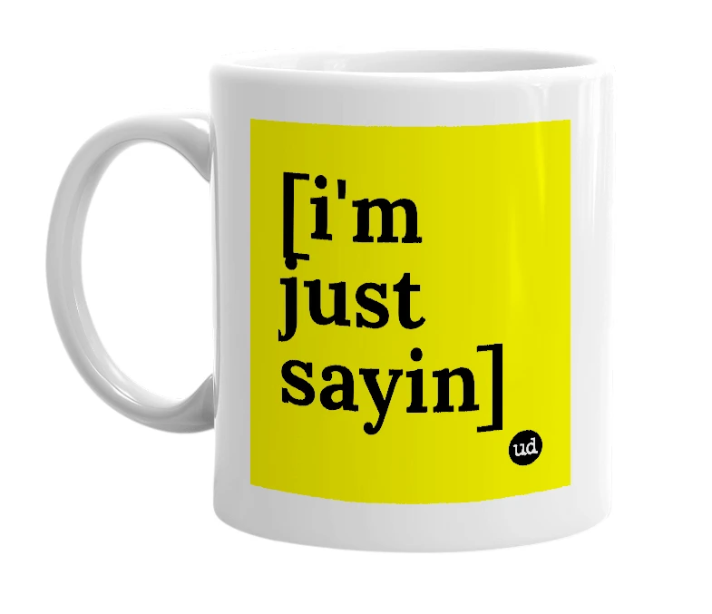 White mug with '[i'm just sayin]' in bold black letters