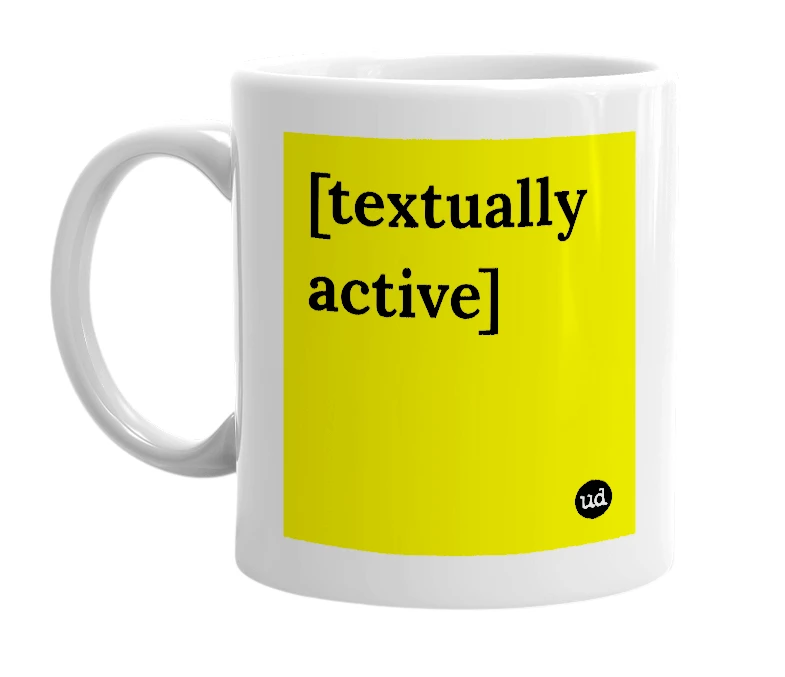 White mug with '[textually active]' in bold black letters