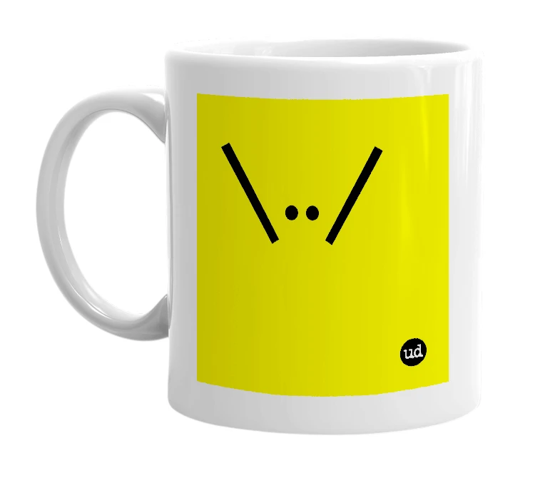 White mug with '\../' in bold black letters