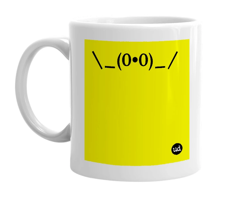 White mug with '\_(0•0)_/' in bold black letters